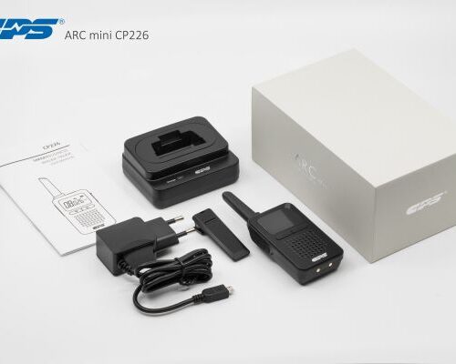 The CPS Telecom CP226 PMR446 Waterproof Walkie-Talkie set includes a radio, charging dock, power adaptor, USB cable, user manual, and branded box, all shown on a white surface.