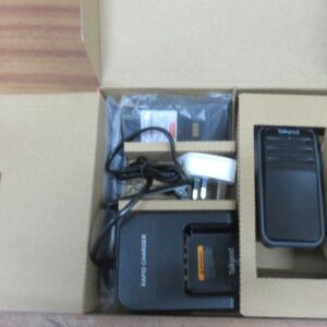 A cardboard box contains a black A50P UHF Mesh Walkie-Talkie, rapid charger, power adaptor, and lead—all packed in separate compartments.