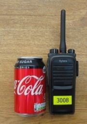 Hytera hire walkie talkie next to Coke can for size comparison